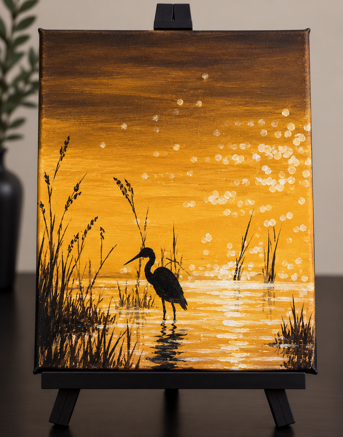Golden water painting with bird silhouette and shimmering reflections for Still Waters Paint Night at String hART Studio in Hammonton NJ